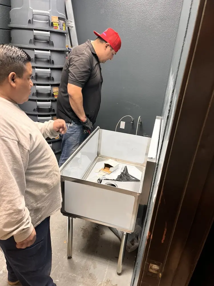 Commercial plumbing and sink installation in North Central